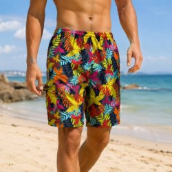 Flerfärgade herrbadshorts med lövmönster, resår och snöre i midjan samt fickor och innerbyxa för bekväm passform.