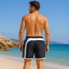 Billiga herr badshorts grå/vit rutiga. Passar bra till simning och bad men även semestern och stranden