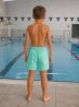 Badshorts i turkos färg med snabbtorkande material