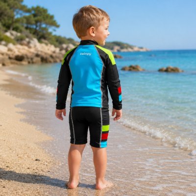 Swimpy UV-badbyxor i svart för barn 2–4 år med färgade sidopaneler. Perfekta badbyxor för simskola och strand.